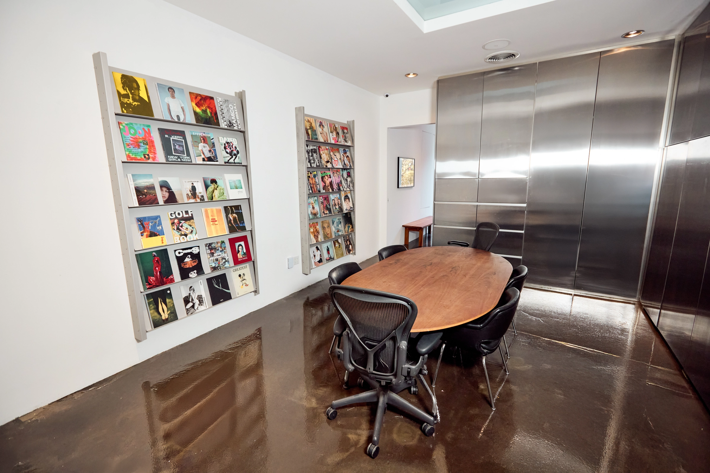 Green room with table and vinyl displays